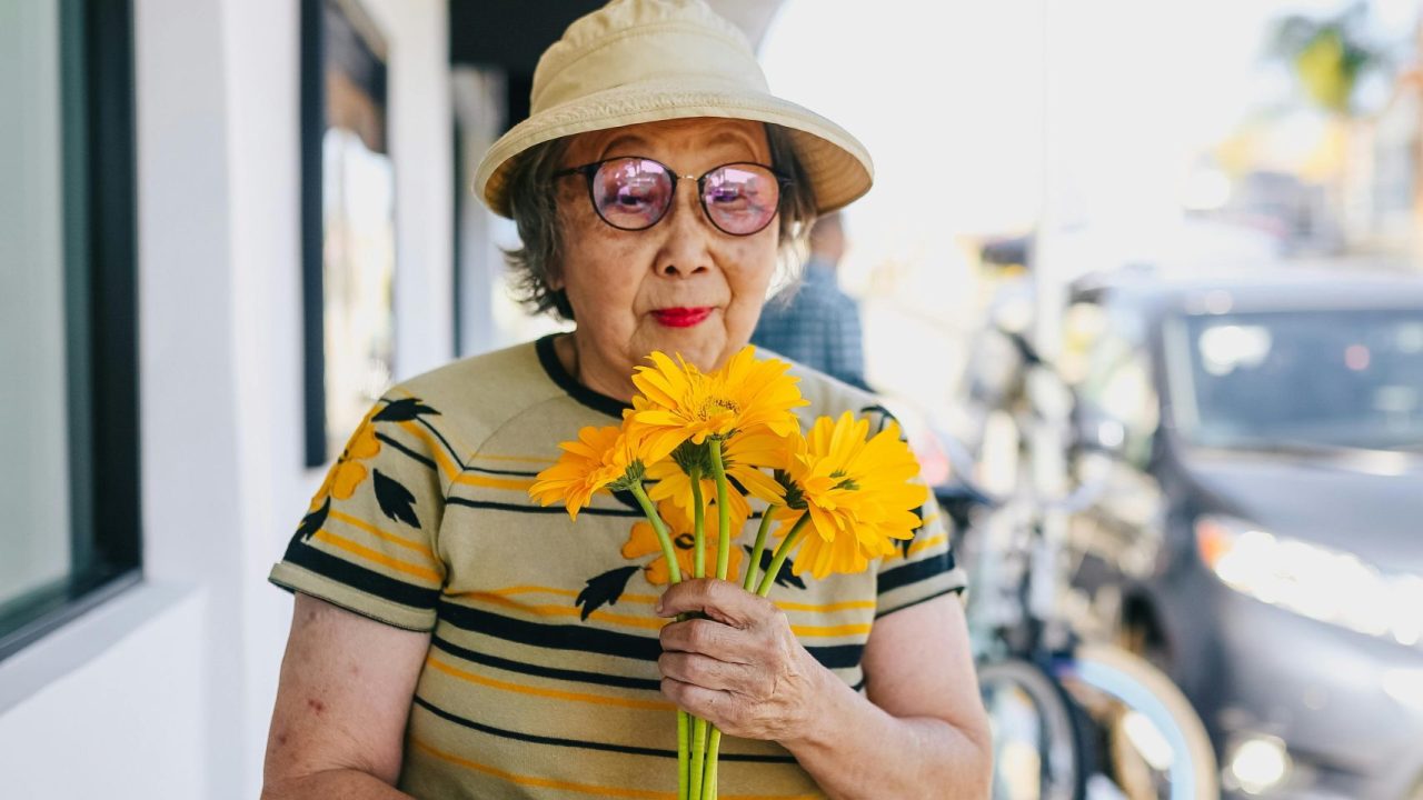Web Photo of Woman with Flowers